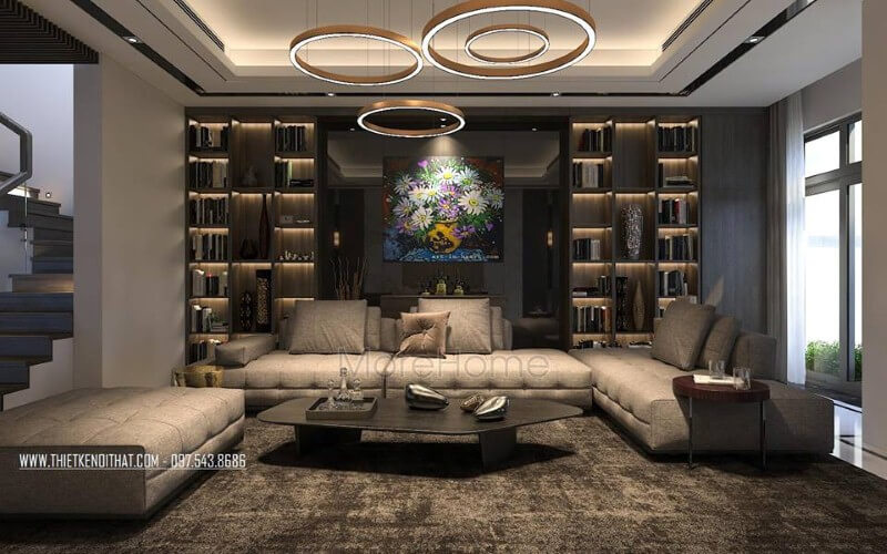 Trang trí nội thất phòng khách hiện đại, sang trọng với bộ bàn ghế sofa lớn, kệ ốp tường, tranh treo tường. Mách bạn các mẫu bố trí phòng khách đẹp