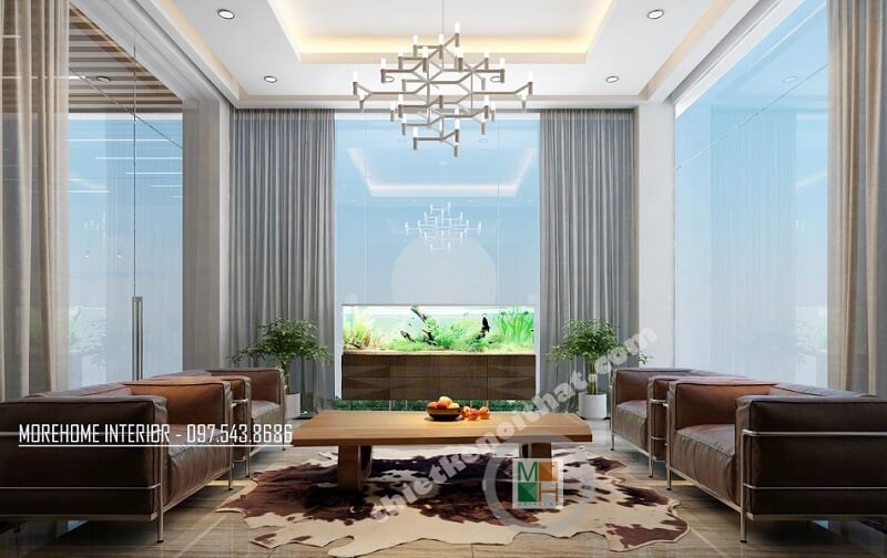 Mẫu thiết kế phòng tiếp khách tại sảnh lớn công ty VCC sang trọng, đẳng cấp với đồ nội thất cao cấp như: sofa da nhập khẩu, bàn gỗ tự nhiên, đèn trang trí,.. Chiêm ngưỡng các mẫu thiết kế phòng khách sang trọng tinh tế