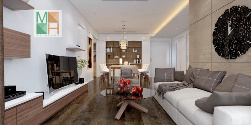 Thiết kế nội thất phòng khách chung cư đơn gian với kệ ti vi treo tường kết hợp bộ sofa màu trắng với gối tựa màu ghi tạo điểm nhấn nổi bật cho căn phòng Thiết kế phòng khách đẹp