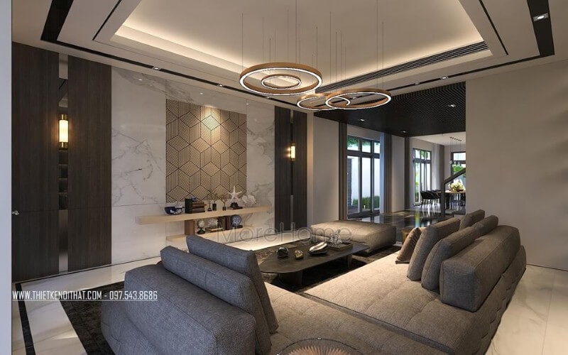 Đá kết hợp cùng gỗ ốp tường là một trong những xu hướng ấn tượng trong trang trí phòng khách hiện đại, cao cấp. Thiết kế phòng khách tại Hà Nội